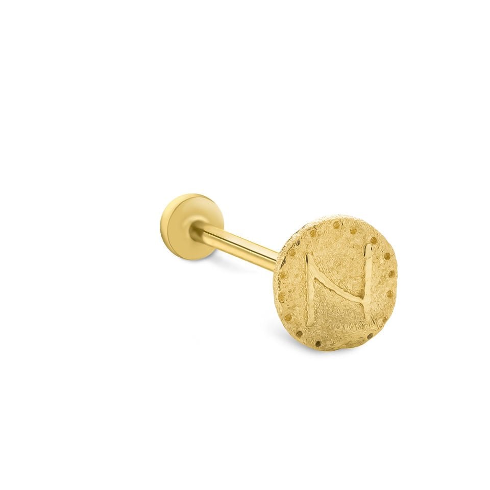 Vintage N Tragus Piercing